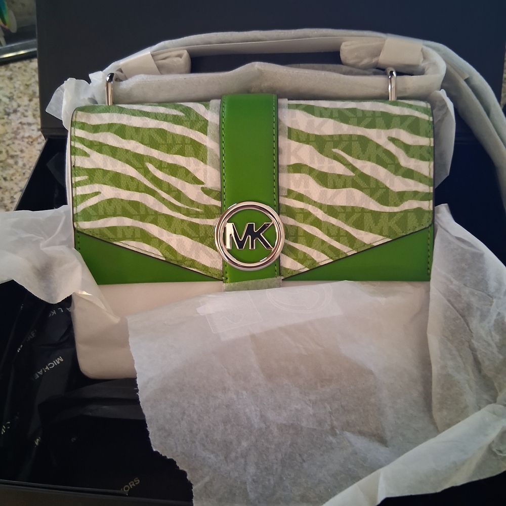 SOLD New Michael Kors Greenwich Animal print logo crossbody bag in Jungle Green